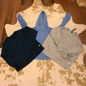 Bundle of three Vuori long-sleeve workout tops